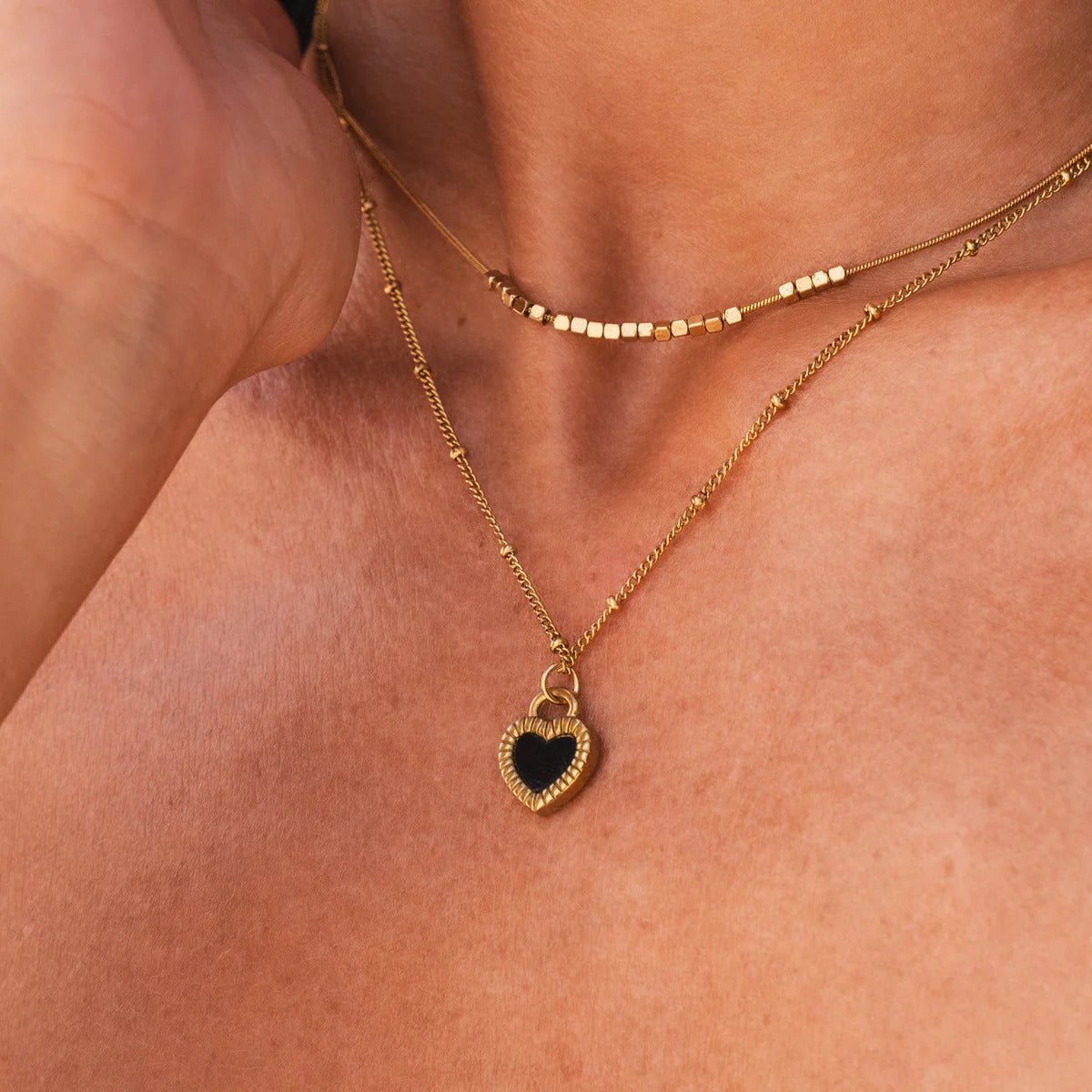 Mix of Marbled Heart Necklaces Plated in 18K Gold