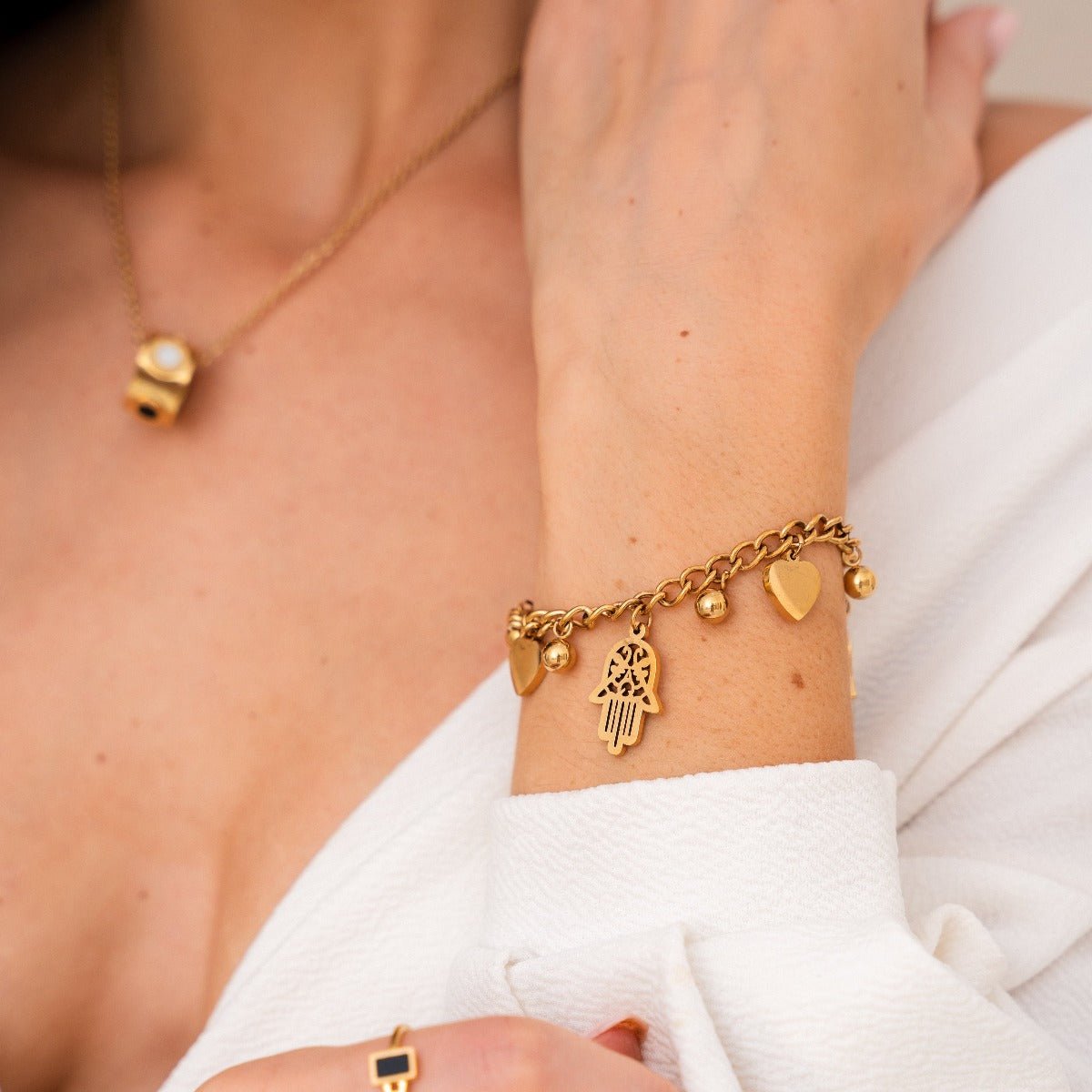 Heart and Hamsa Charm Bracelet Plated in 18K Gold